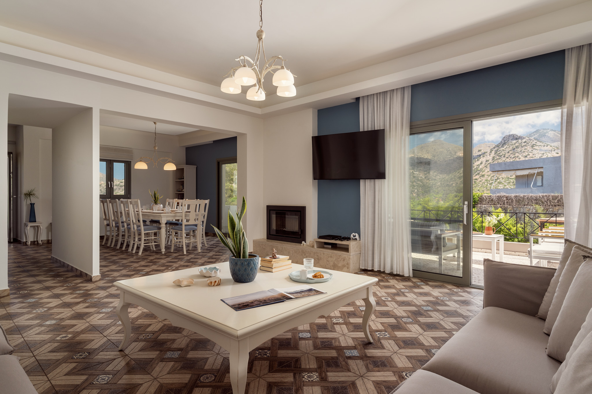 The spacious living room combines stylish furnishings with warm, inviting family comfort. The spacious living room combines stylish furnishings with warm, inviting family comfort.